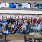 Group photo of hundreds of bowling event participants at alley