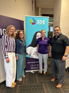 Group of adults standing and smiling