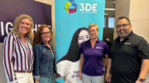 Group of adults standing and smiling